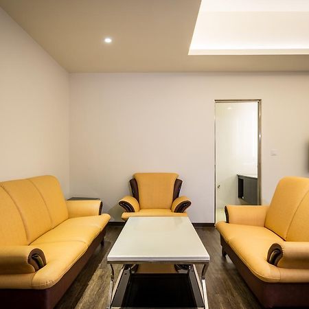 Midu Business Hotel Xiluo Exterior foto