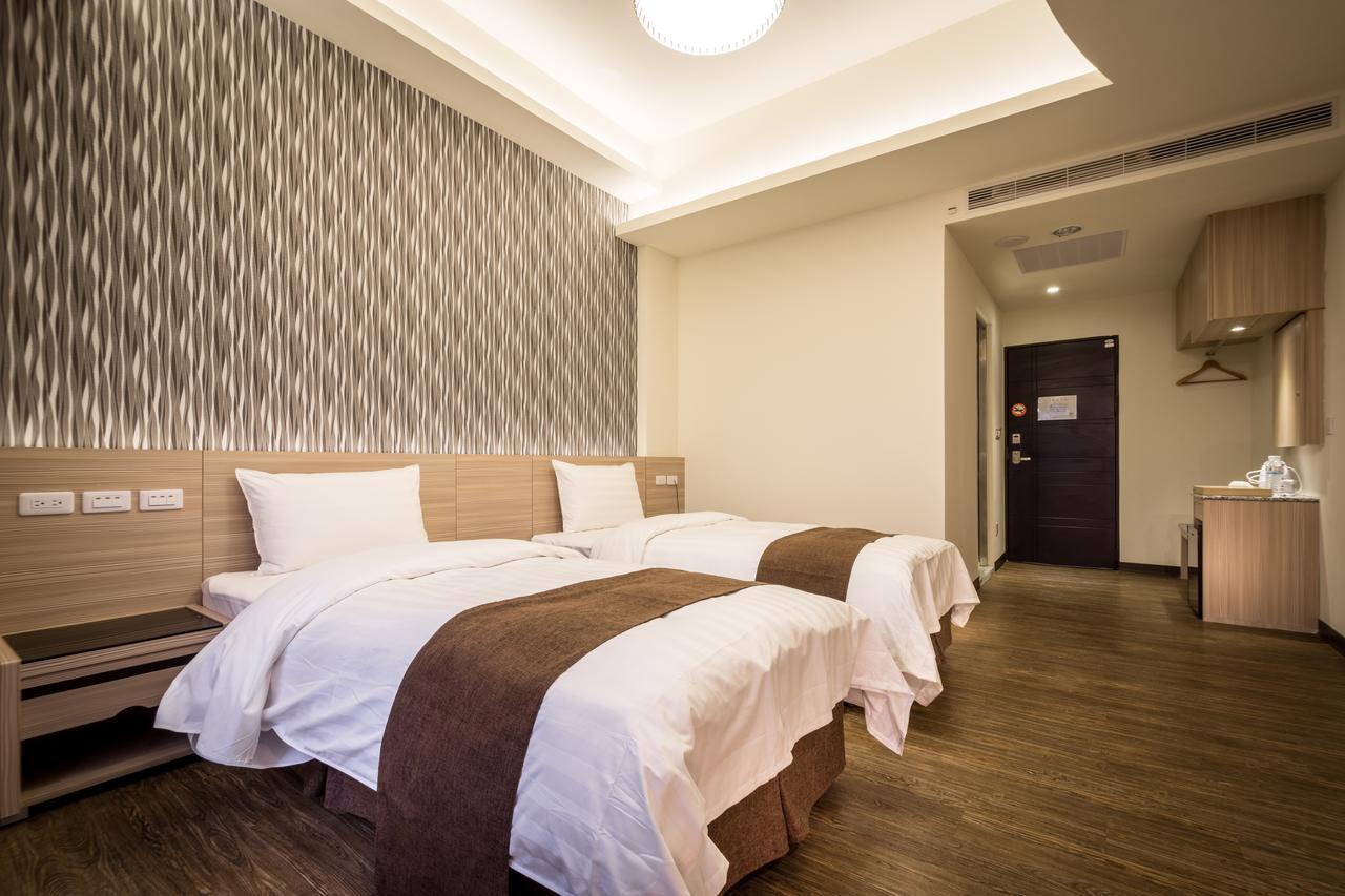 Midu Business Hotel Xiluo Exterior foto